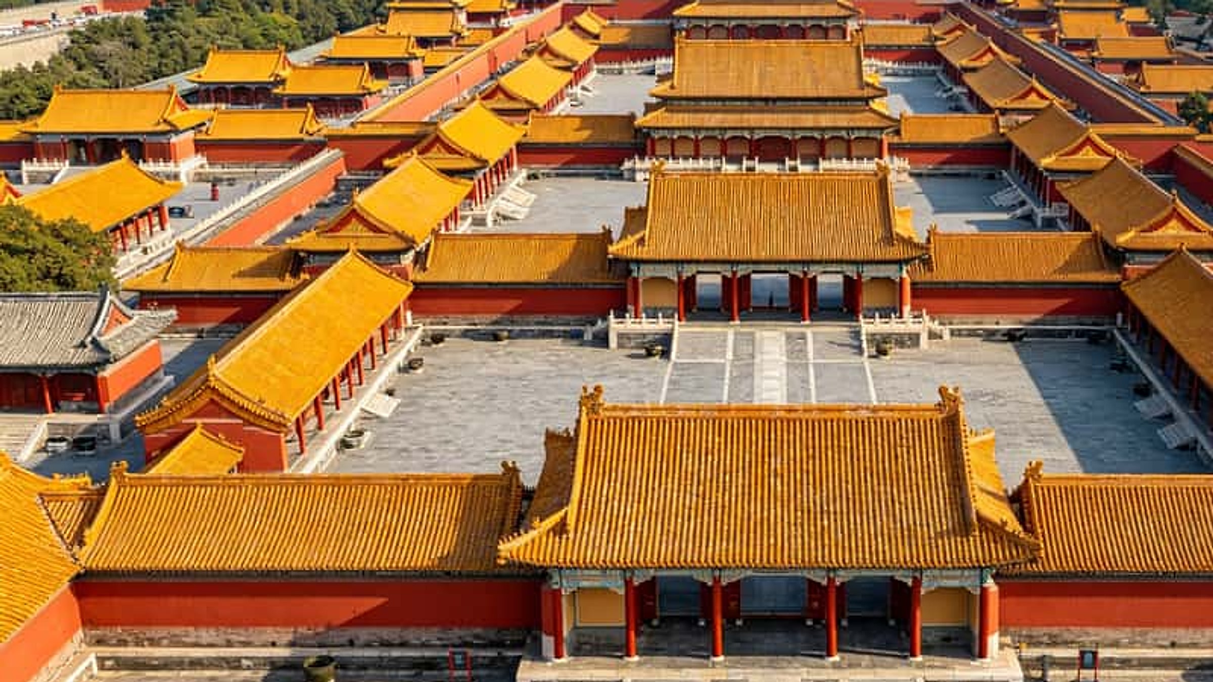 Aerial view of the Forbidden City — red walls and golden roofs of the imperial palace complex, Beijing's most iconic landmark