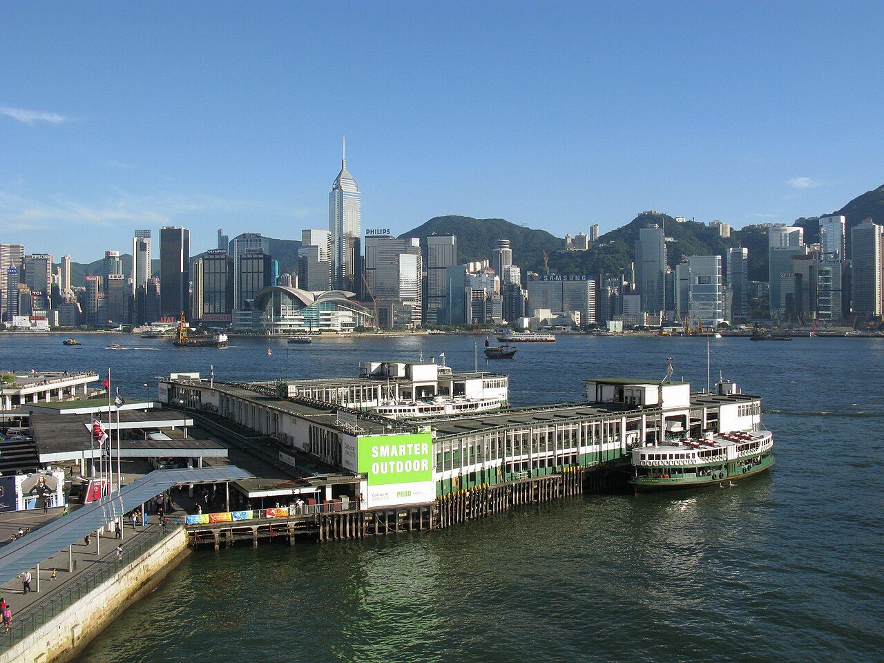 Star Ferry at Tsim Sha Tsui Pier, with Victoria Harbour and Hong Kong Island skyline behind