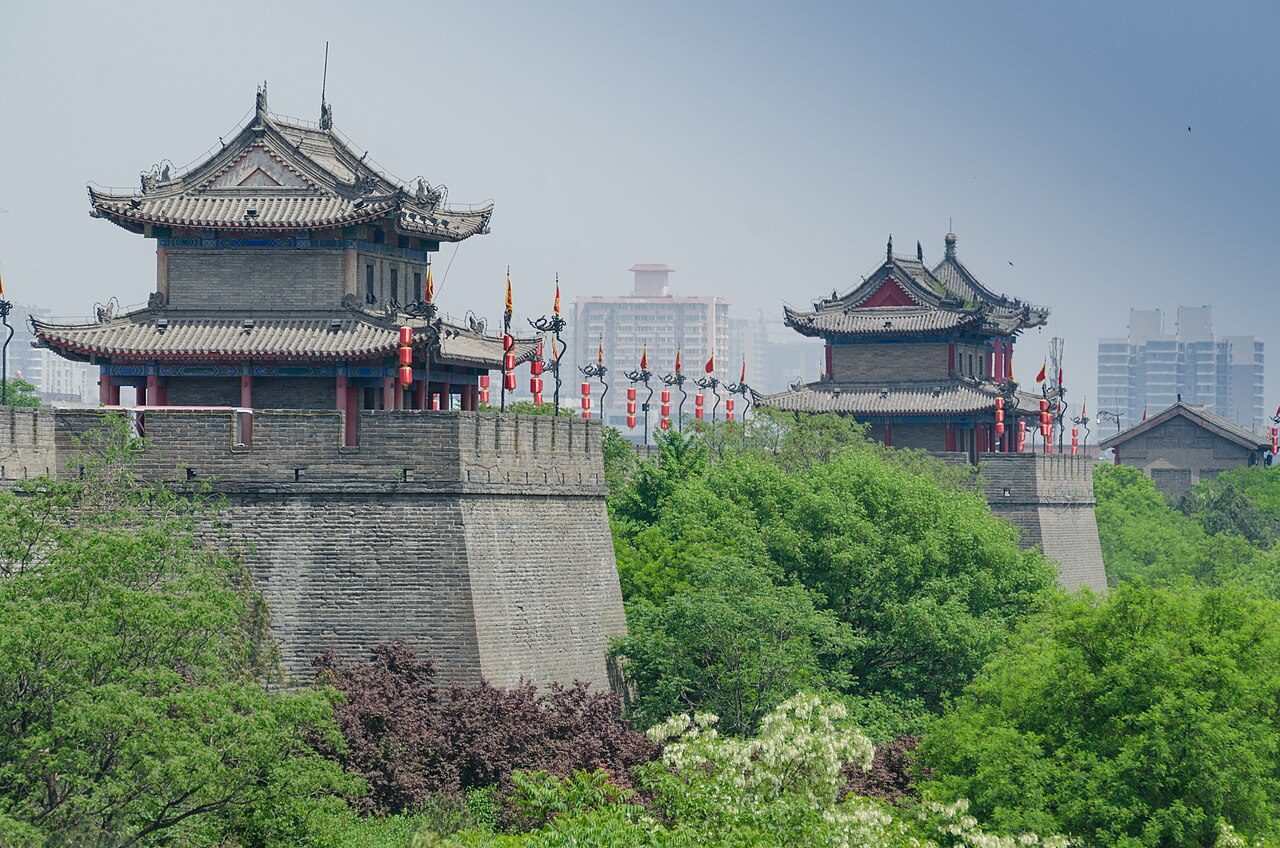 Xi'an City Wall's South Gate (Yongning Men) lit up at night with traditional lanterns