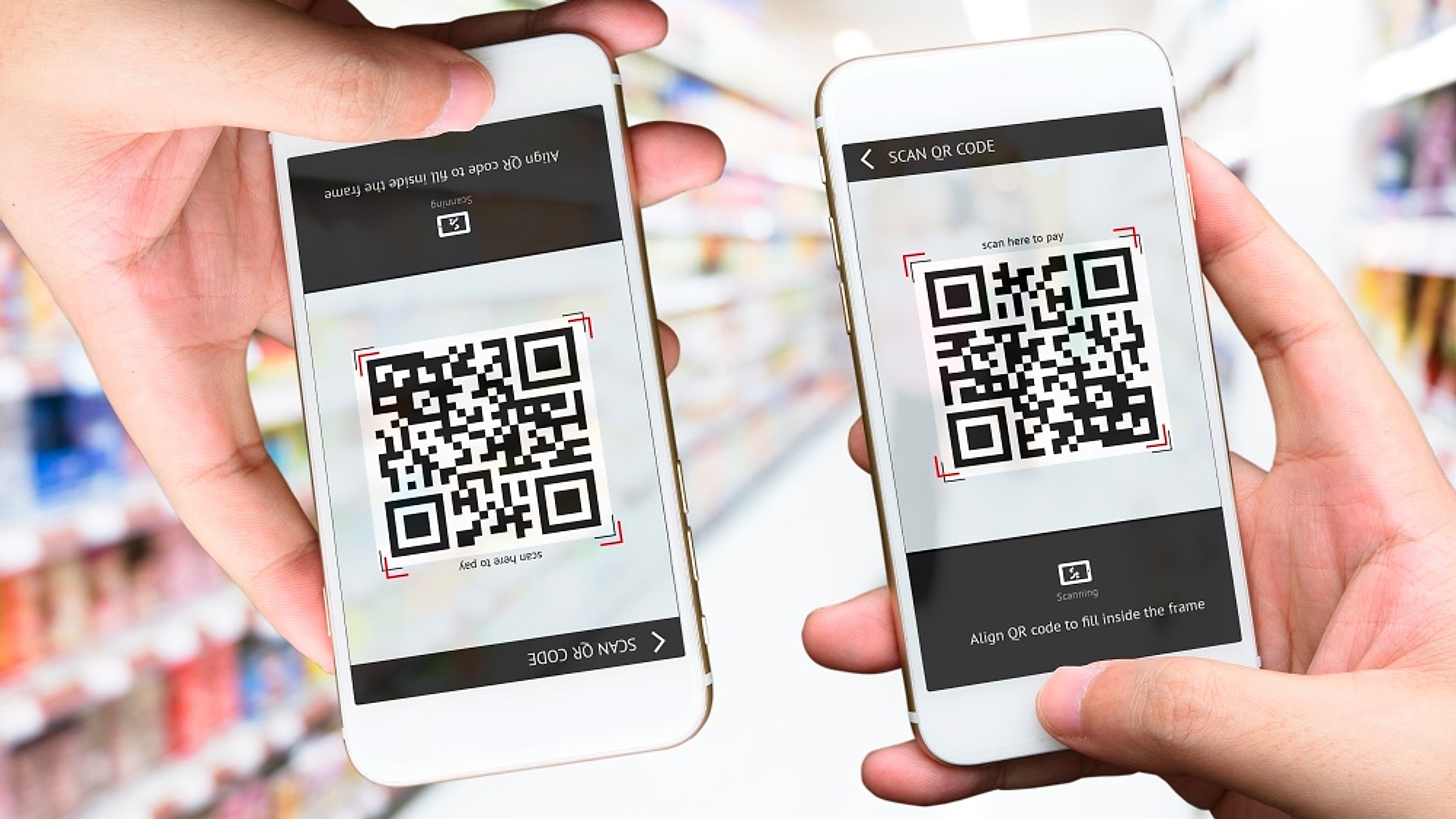 Zwei Telefone scannen Alipay-QR-Codes an einem U-Bahn-Drehkreuz – der Bildschirm „Hier scannen, um zu bezahlen“ mit Ausrichtungshilfen für den Zutritt