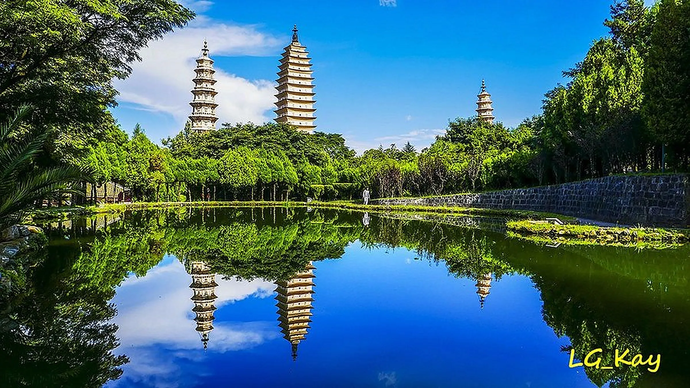 Cangshan Mountain (苍山) — a 19-peak mountain range rising to 4,122m directly above Erhai Lake, with hiking trails and the famous 18 Streams waterfalls.