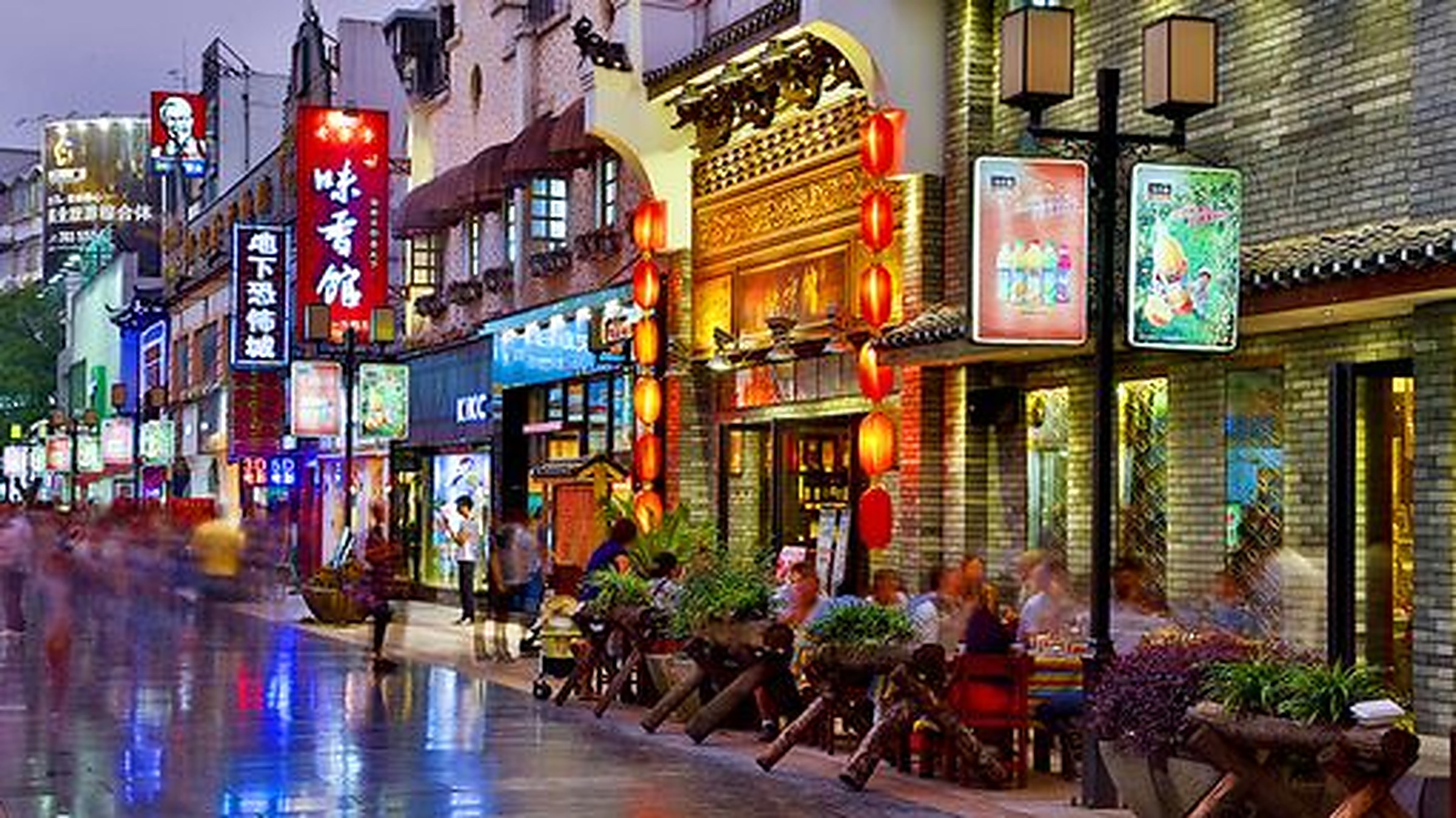 Traditional shopfronts on Yangshuo West Street, a stone-paved pedestrian lane dating to 1400 AD.