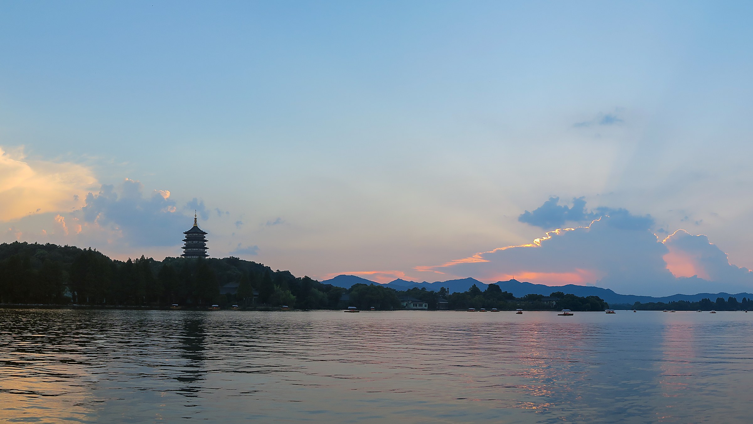 Leifeng Pagoda at sunset over West Lake.