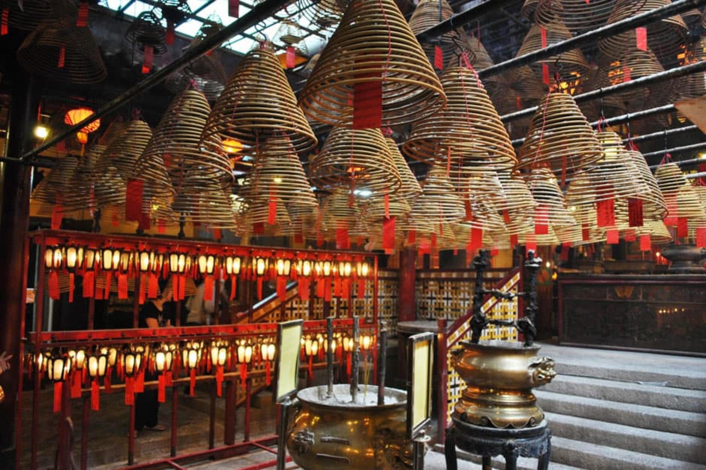 Man Mo Temple — 1847 Taoist temple in Sheung Wan with hanging spiral incense coils, the oldest temple in Hong Kong.