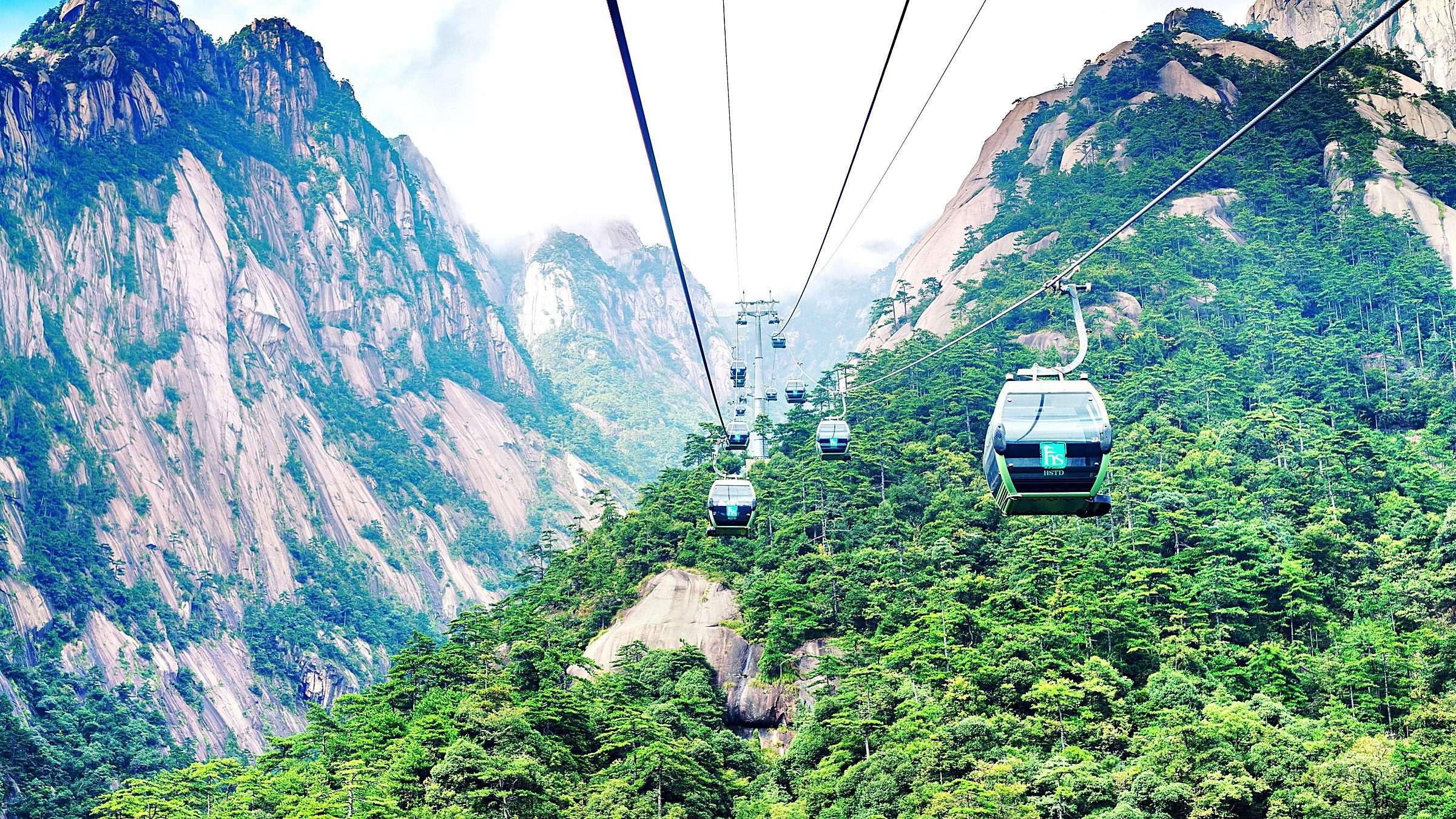 Bright Summit Peak (光明顶) — the second-highest peak of Mount Huangshan at 1,860m, the best sunrise and sea-of-clouds viewpoint, with the meteorological station at the top.