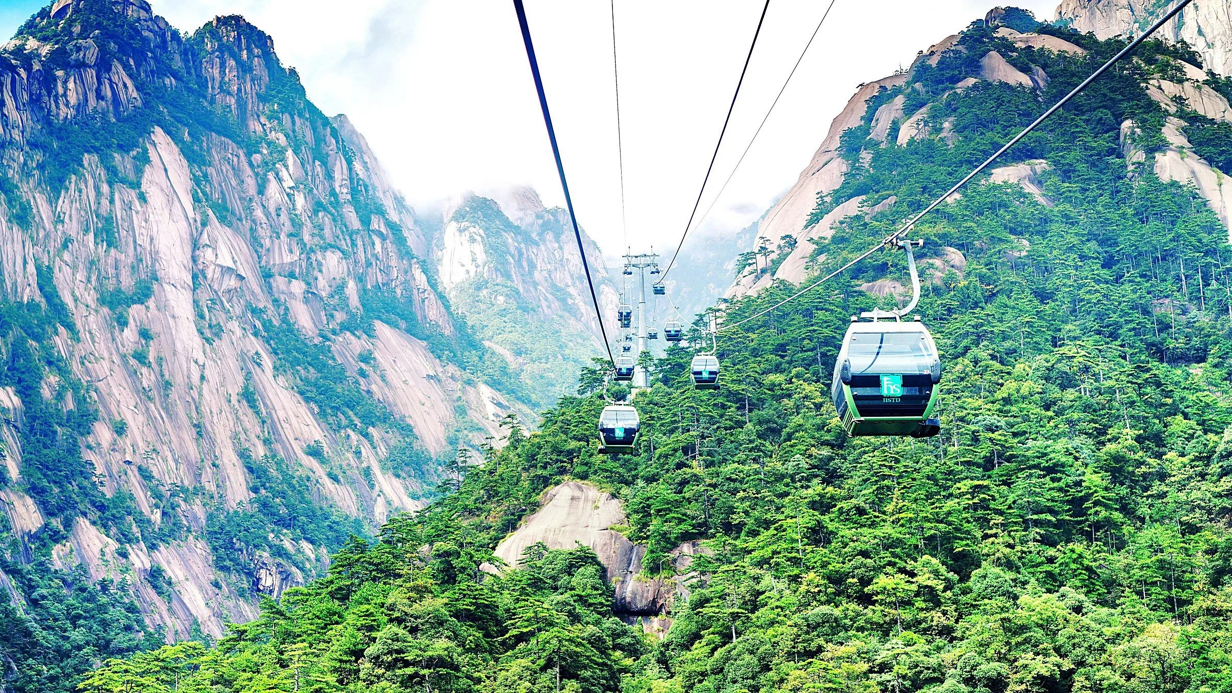Bright Summit Peak (光明顶) — the second-highest peak of Mount Huangshan at 1,860m, the best sunrise and sea-of-clouds viewpoint, with the meteorological station at the top.