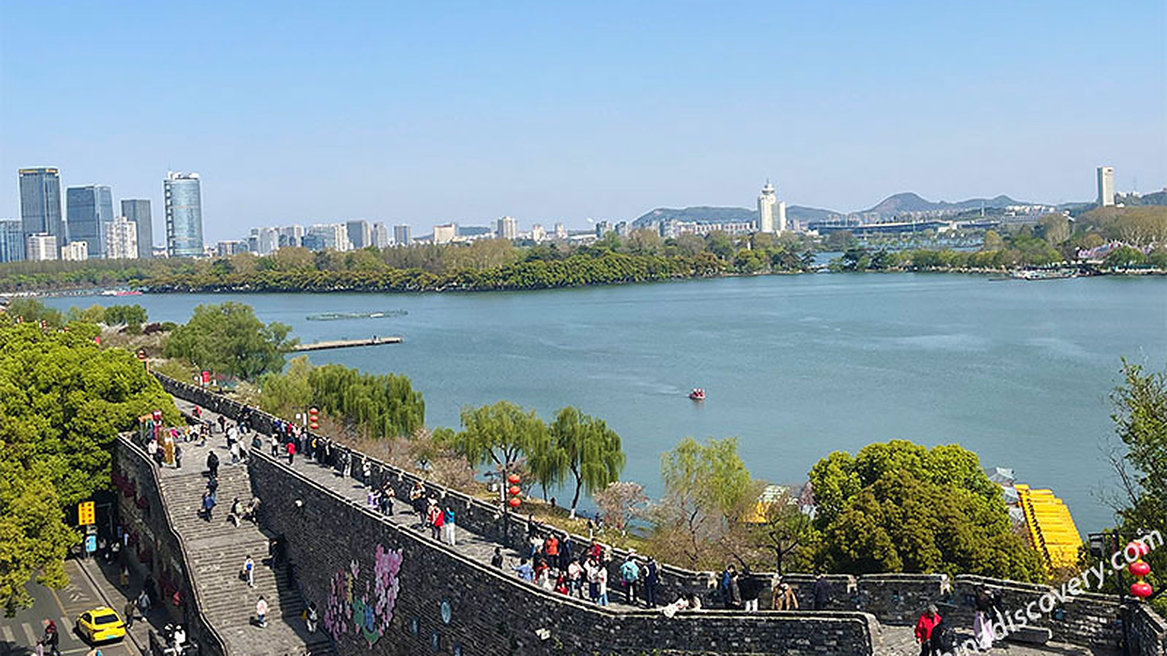 Ming-dynasty city wall above Xuanwu Lake — 600 years old, the longest city wall ever built.
