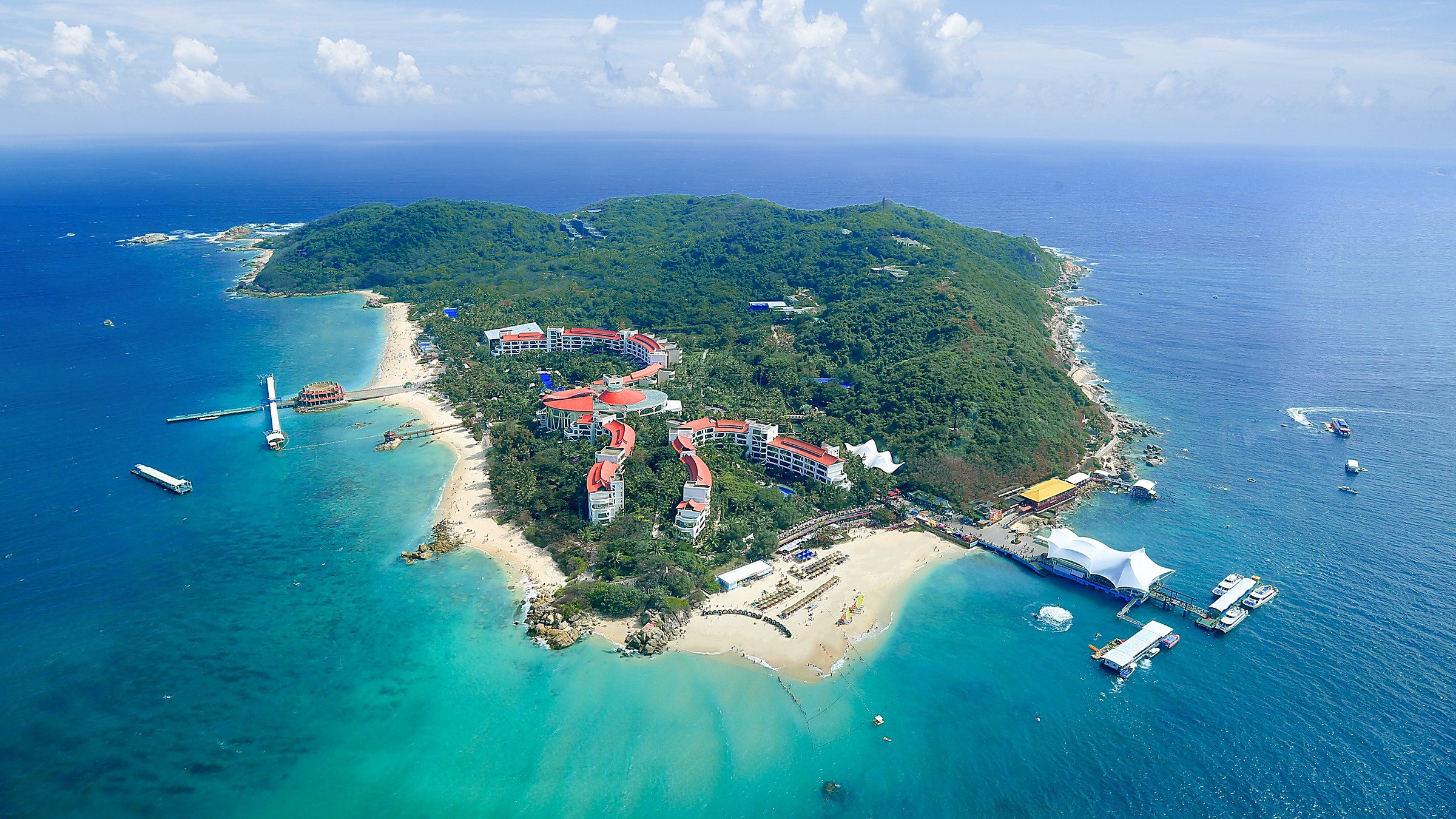 Wuzhizhou Island (蜈支洲岛) — a coral-fringed island 30 minutes offshore, with some of China's best snorkeling, diving, and glass-clear water.