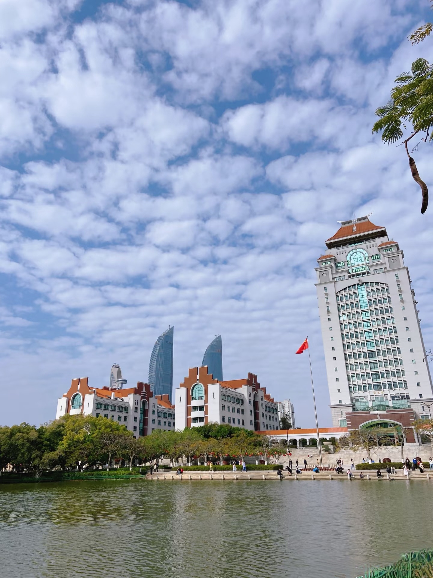 Xiamen University (厦门大学) — one of China's most beautiful campuses, with Tan Kah Kee's Jiageng-style red-brick buildings, Furong Lake, and adjacent to Nanputuo Temple.