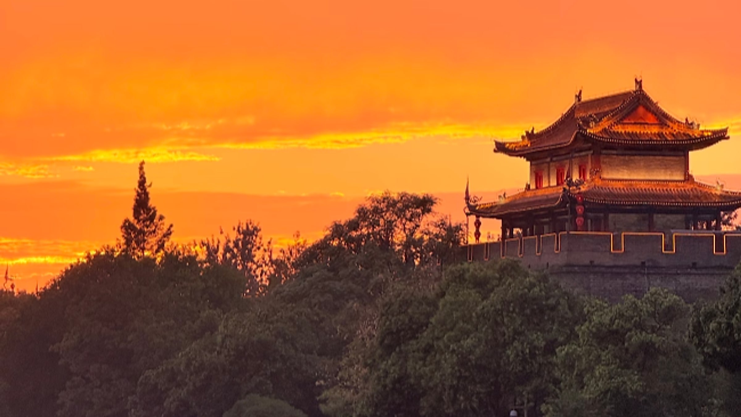 Xi'an City Wall at sunset — the best-preserved city wall in China, 14 km long.