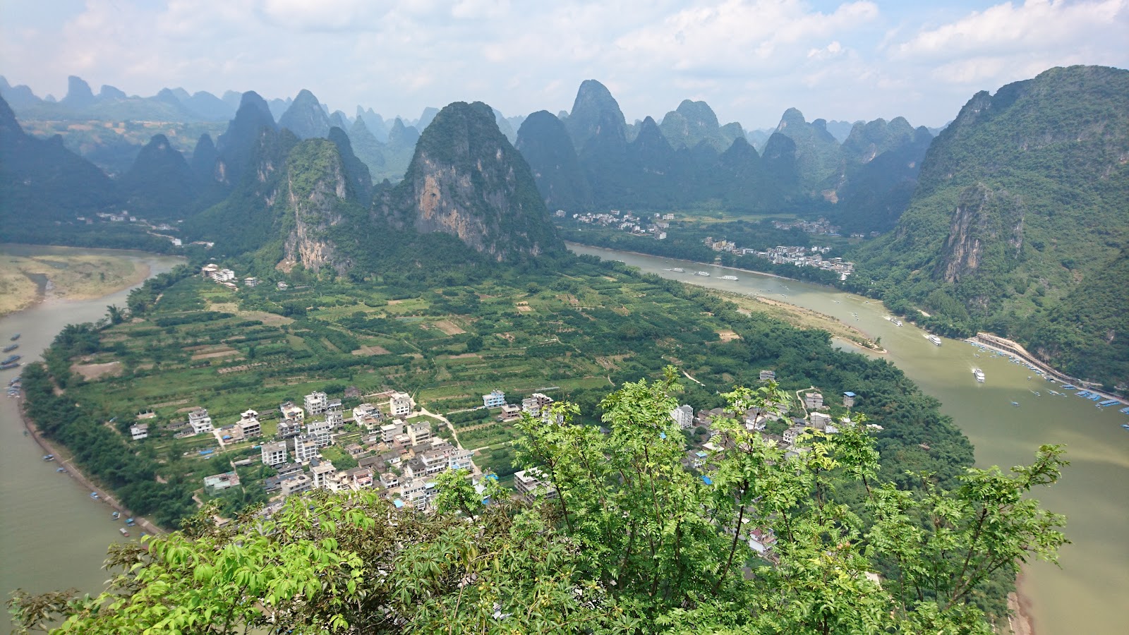 Xingping Ancient Town (兴坪) — a 1,700-year-old Li River fishing town with the karst peak featured on the back of the ¥20 banknote, the most-photographed karst view in China.