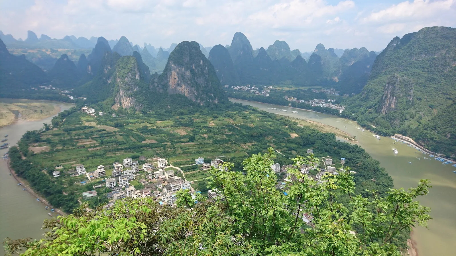 Xingping Ancient Town (兴坪) — a 1,700-year-old Li River fishing town with the karst peak featured on the back of the ¥20 banknote, the most-photographed karst view in China.