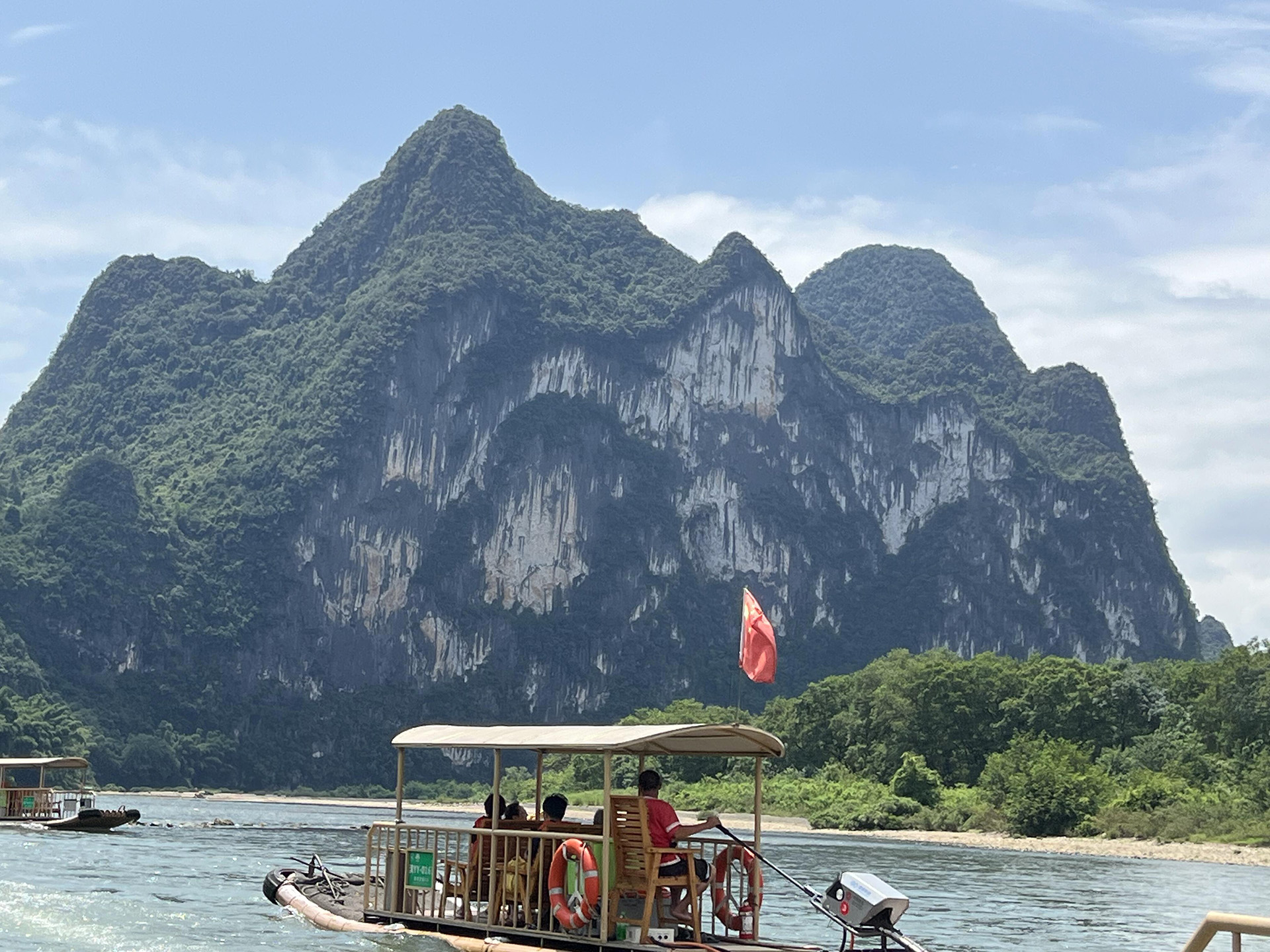 Li River cruise (漓江) — China's most iconic river cruise from Guilin to Yangshuo, passing the 20-RMB-back-view karst peak and the 100-peak karst landscape (UNESCO South China Karst).