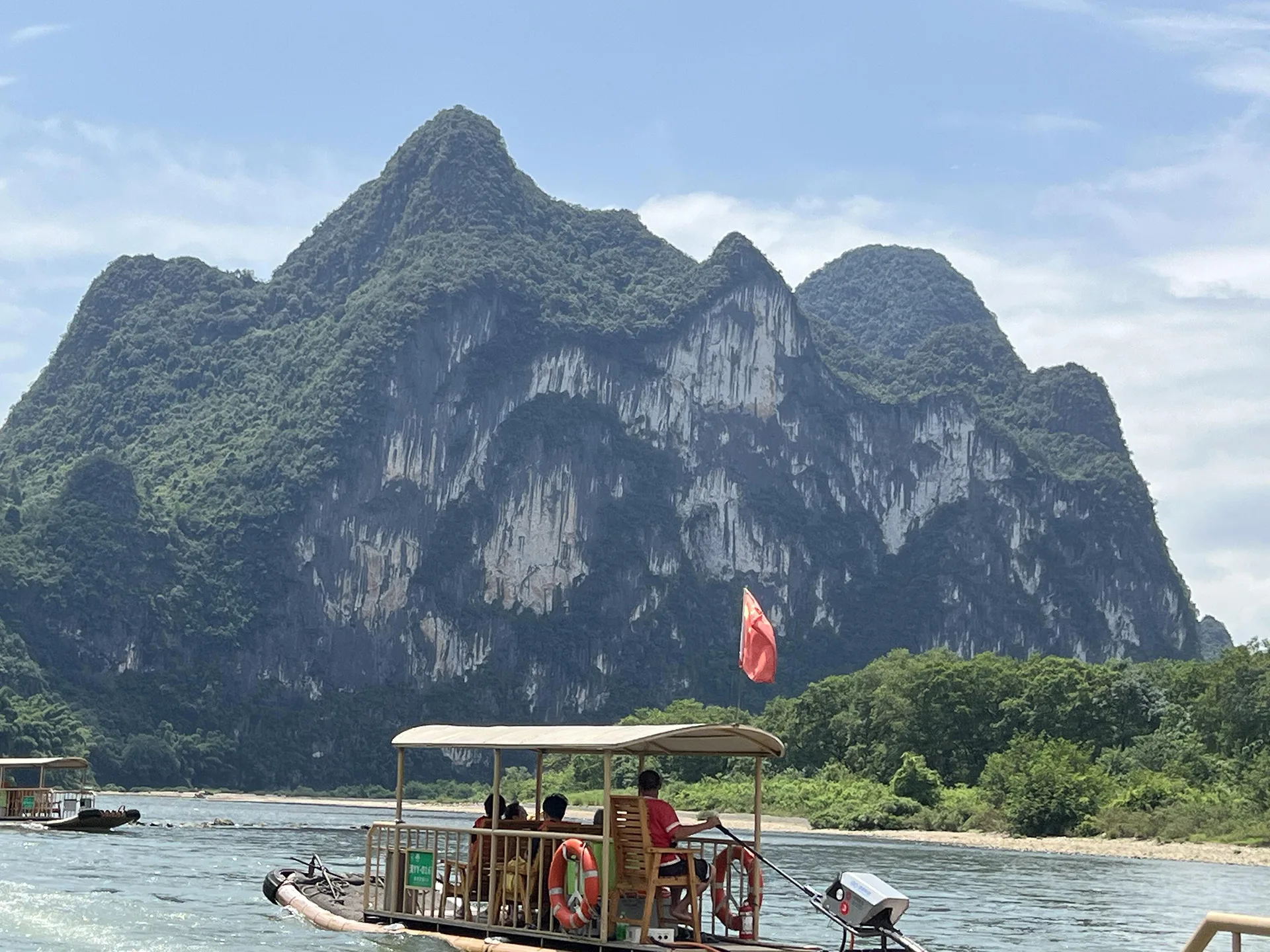 Li River cruise (漓江) — China's most iconic river cruise from Guilin to Yangshuo, passing the 20-RMB-back-view karst peak and the 100-peak karst landscape (UNESCO South China Karst).