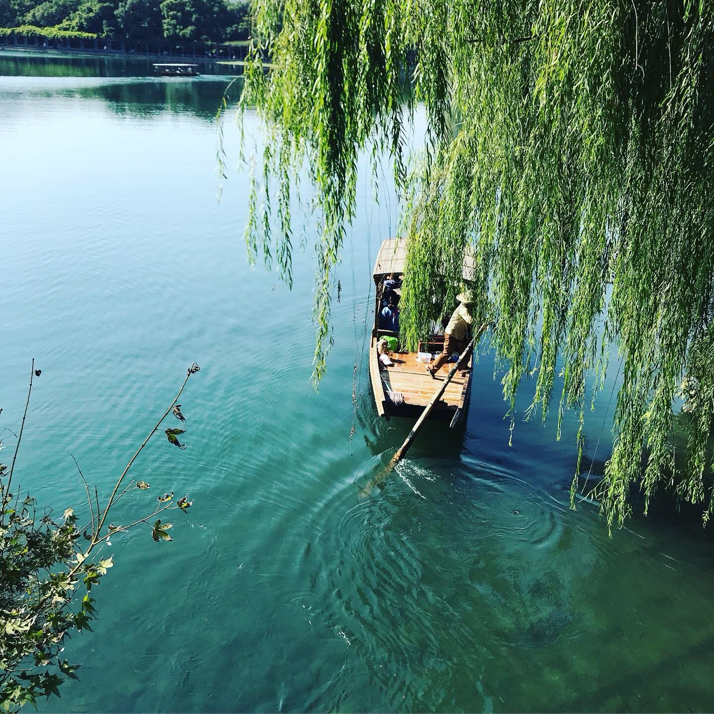 Sunset over West Lake with Leifeng Pagoda — the iconic Hangzhou scene.
