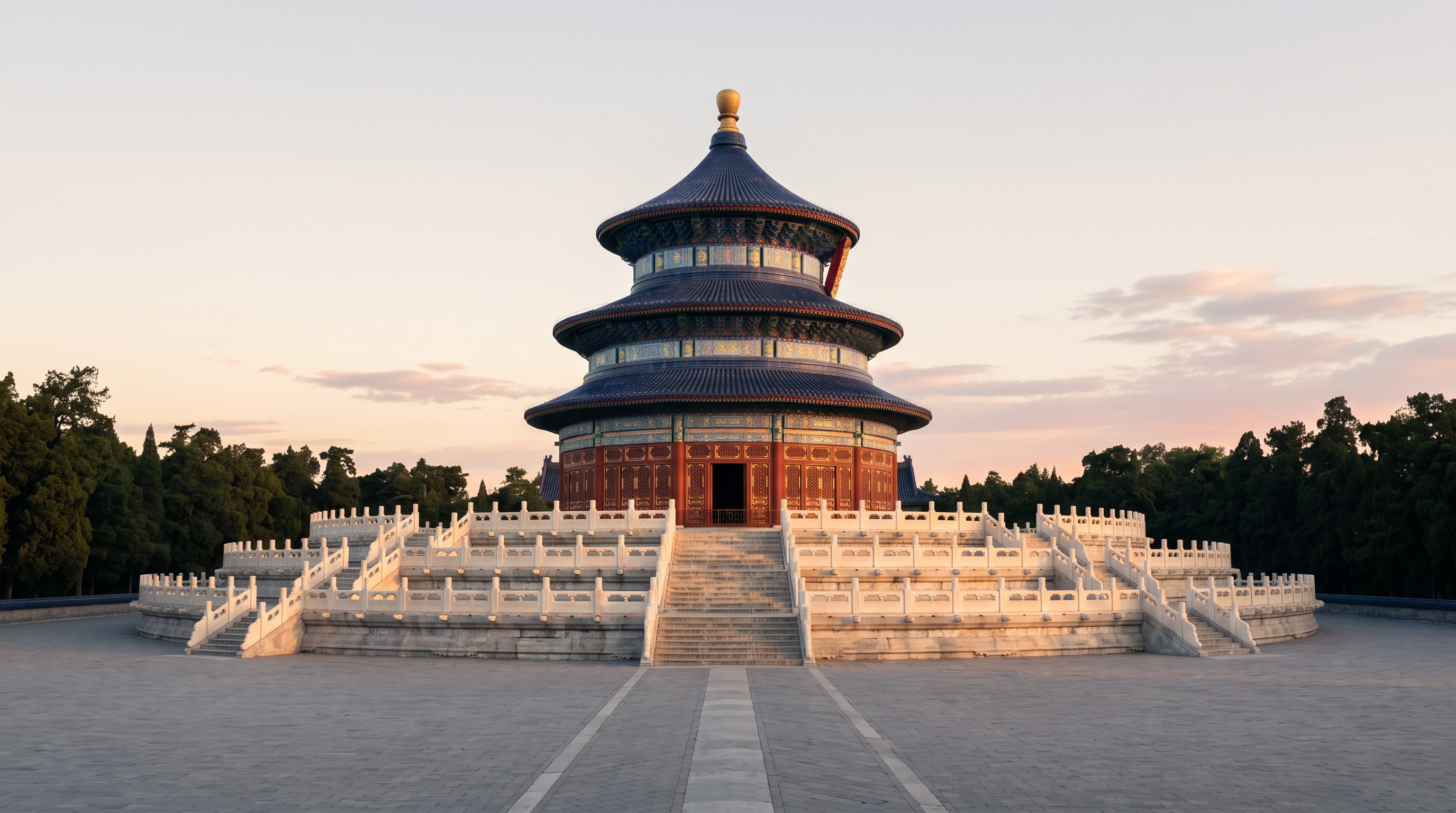 The Hall of Prayer for Good Harvests at the Temple of Heaven in Beijing, a triple-eaved circular wooden pavilion with deep blue-tiled roof, vermillion pillars, and a marble terrace, photographed at dawn with soft golden light